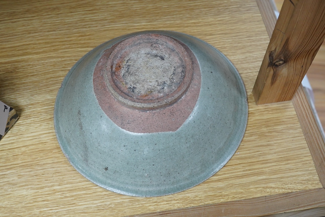 A Vietnamese glazed bowl with incised decoration, 23cm in diameter